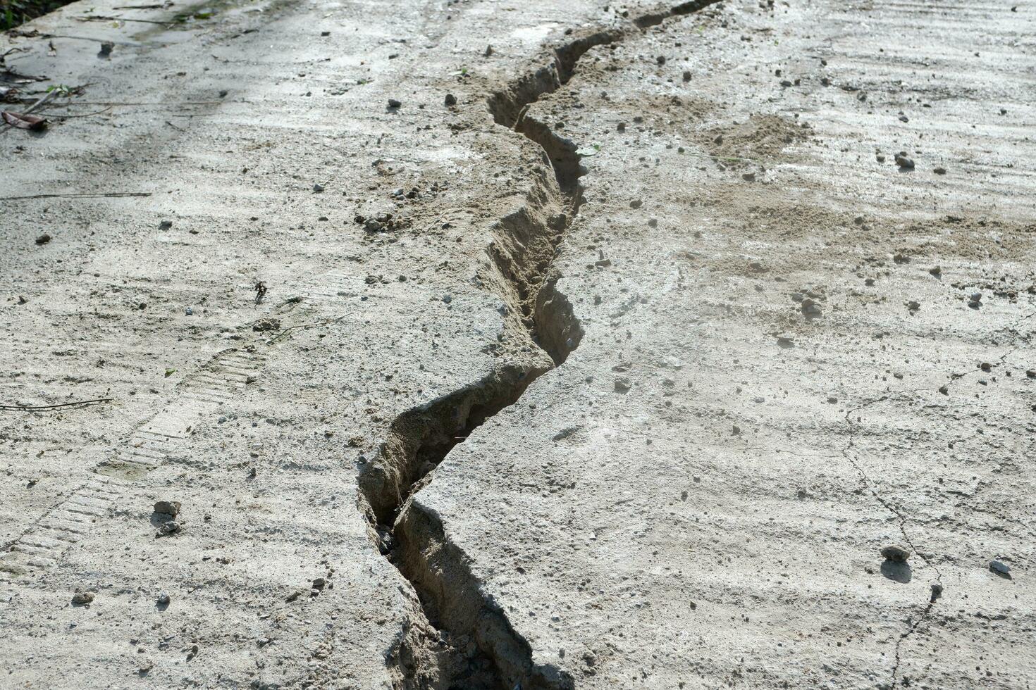 Photography of texture cracks on the road photo