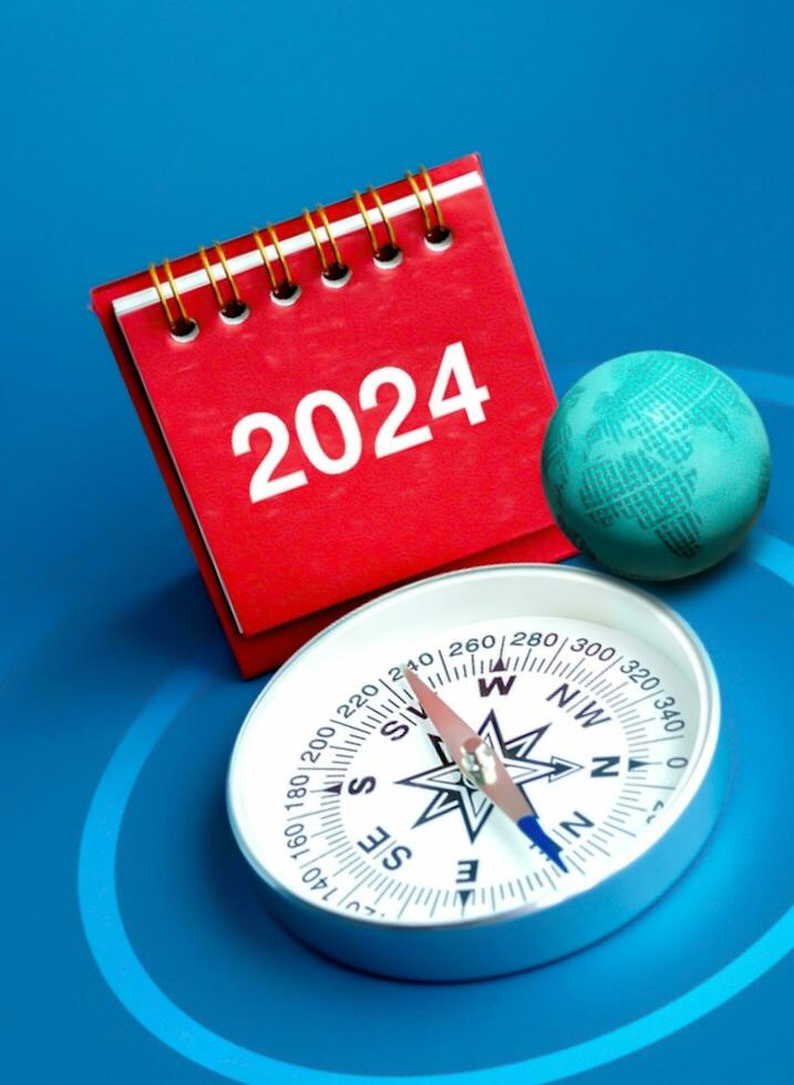 Happy new year 2024, 3d earth orb with digital world map placed on white block stack with 2024 year numbers with searching icon and rising arrow, trend growth graph on blue background. photo