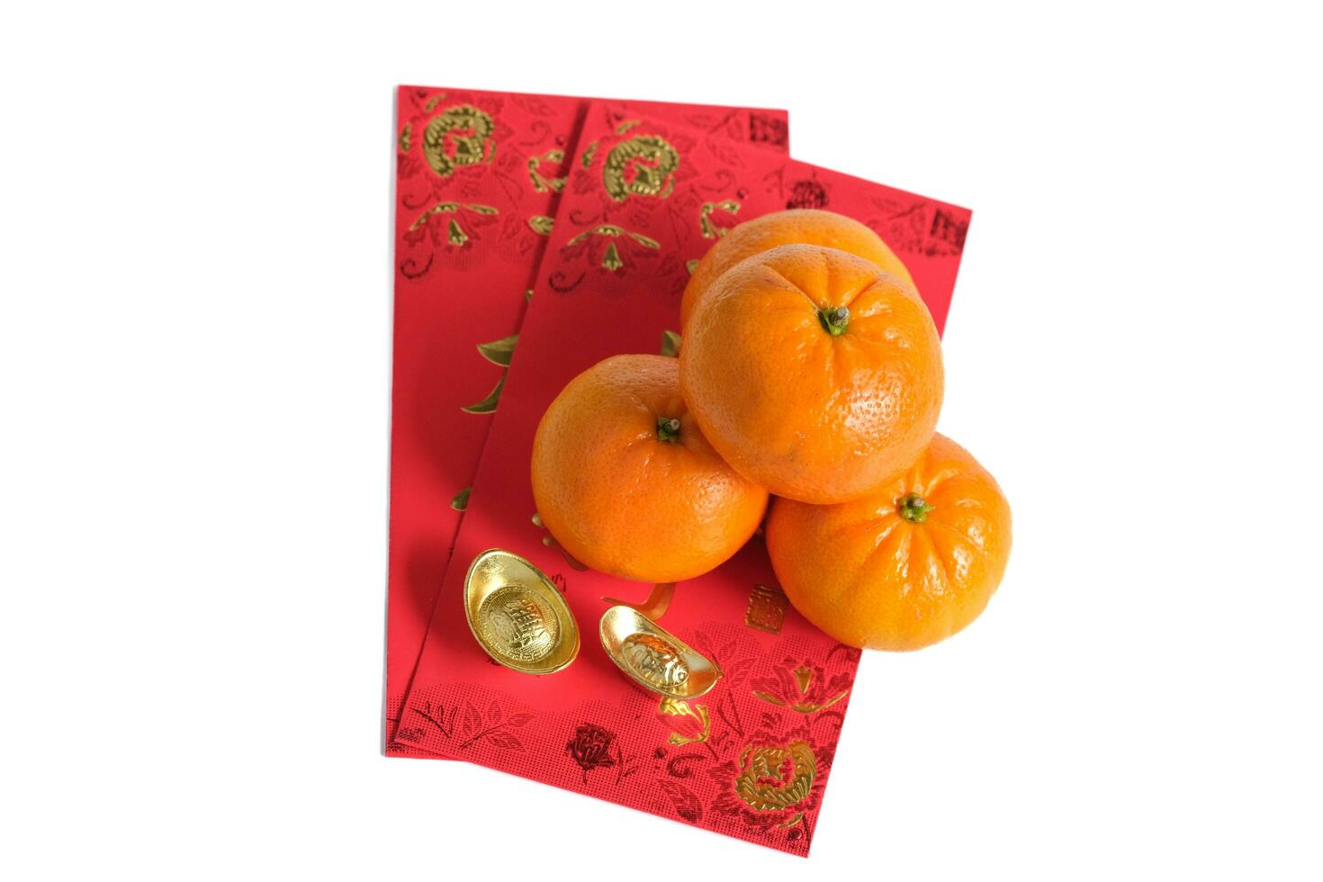 Happy New Year Chinese year of dragon 2024. Mandarin orange and gold ingots on red envelopes isolated on white background. photo
