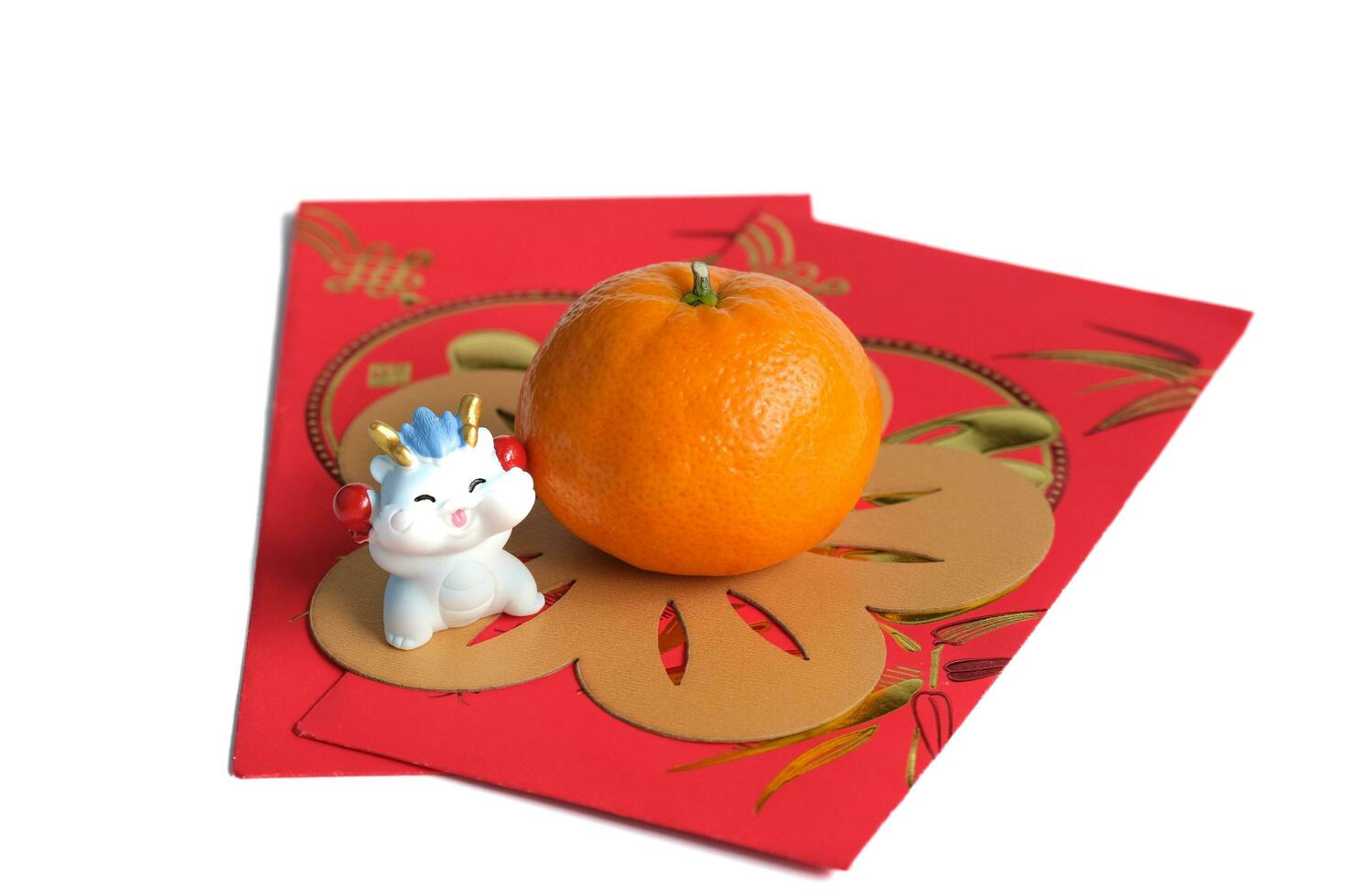 Happy New Year Chinese year of dragon 2024. Mandarin orange, dragon on red envelopes isolated on white background. photo
