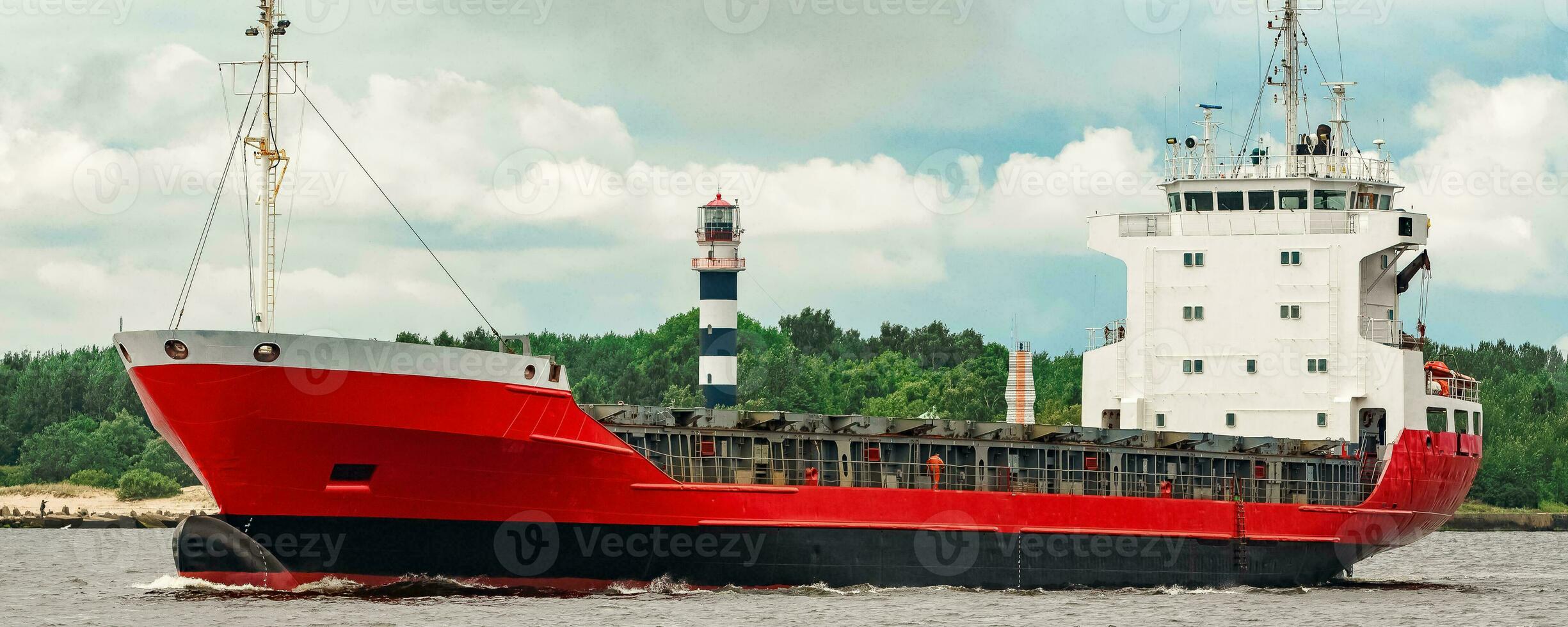 Red new cargo ship moving abroad. Product export in Europe photo