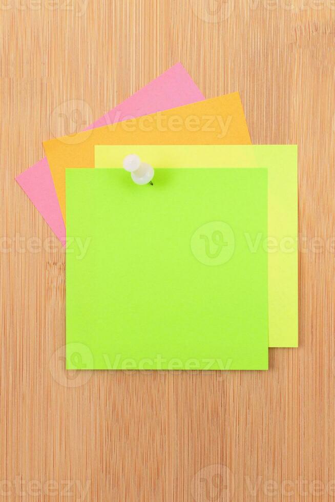 Colored Sticky Notes with Copyspace Pinned to the Wooden Message Board. To Do List Reminder in Office. Blank Memo Sticker at Work Template. Empty Checklist Mockup photo