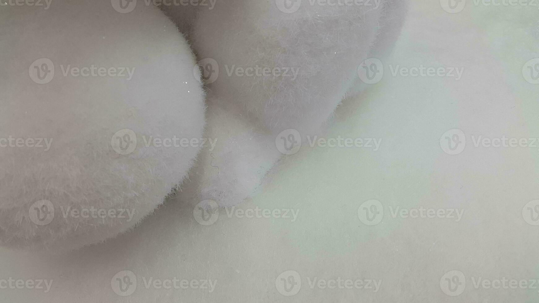 Fluffy texture. Soft white fluffy surface. Fuzzy background photo