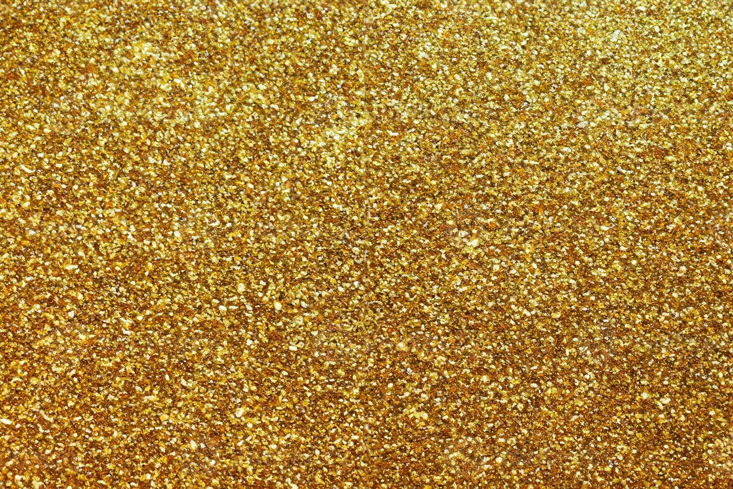 Abstract gold glitter sparkle background photo