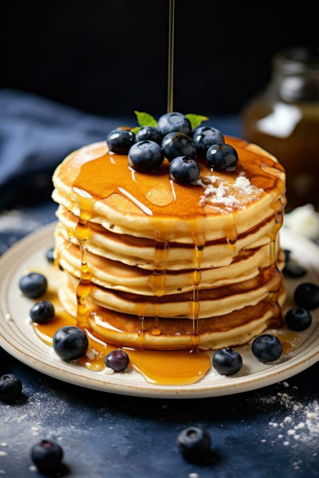 AI generated A stack of fluffy pancakes topped with blueberries and a drizzle of maple syrup photo