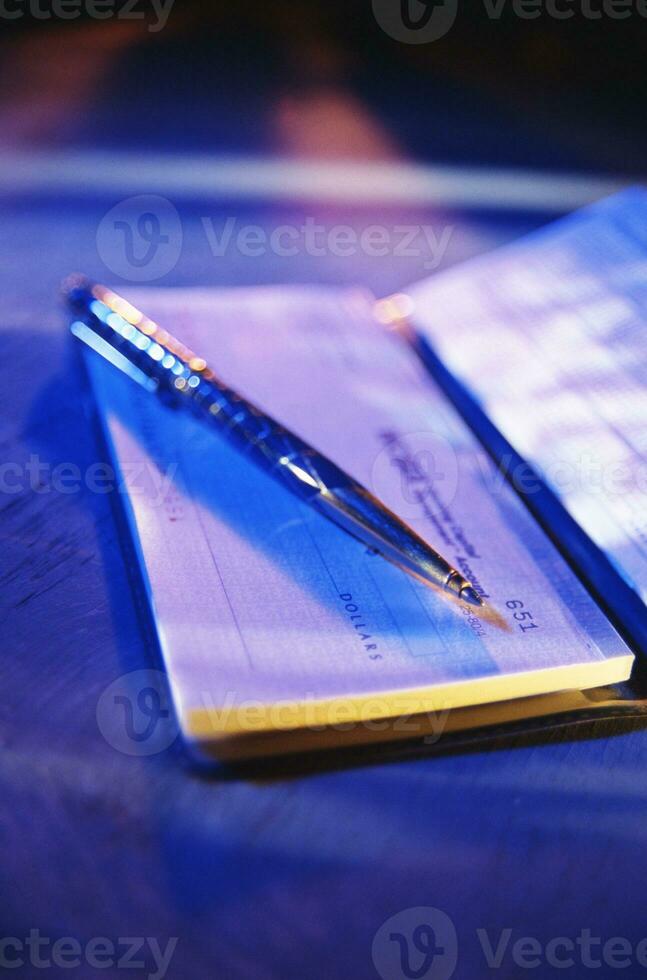 cheque with pen bank finance macro photo