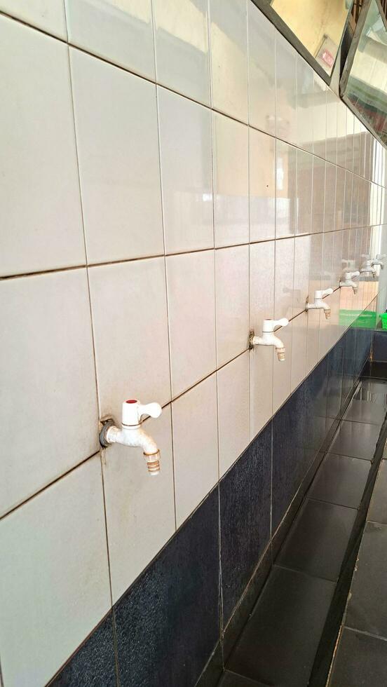 row of water faucets photo