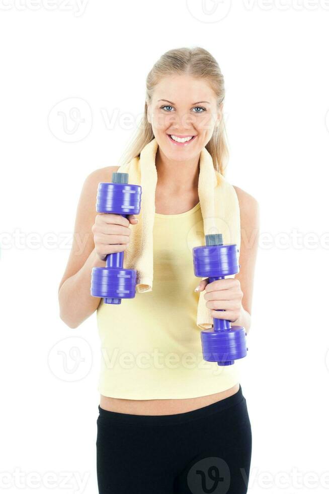 Sporty woman  with weights photo