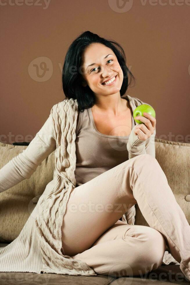 Woman eating apple photo