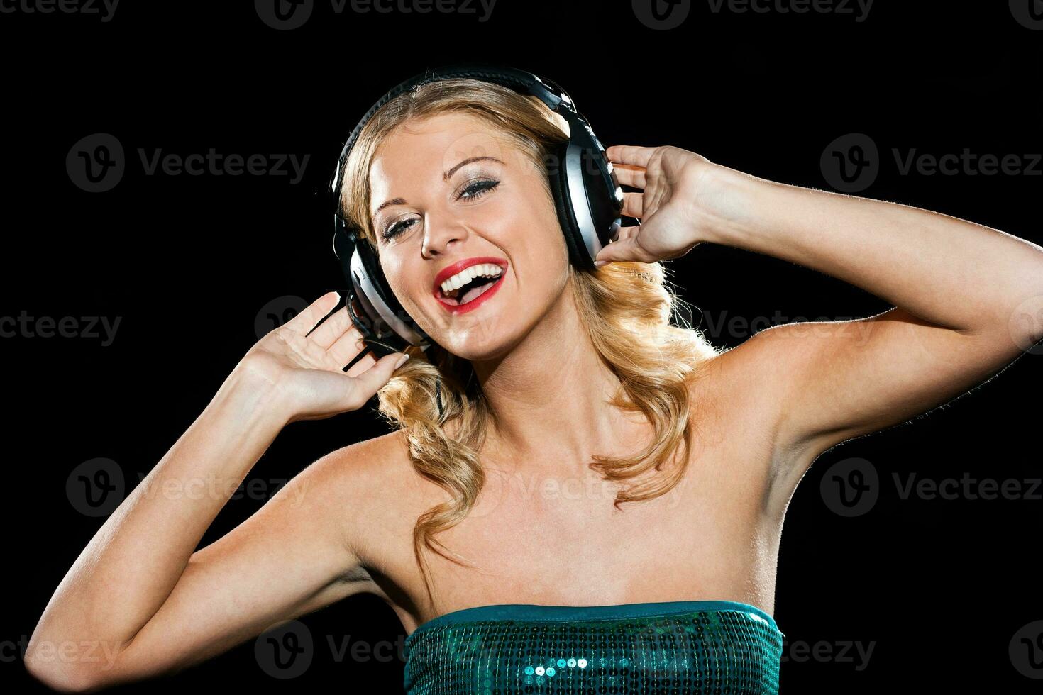 Happy girl with headphones photo