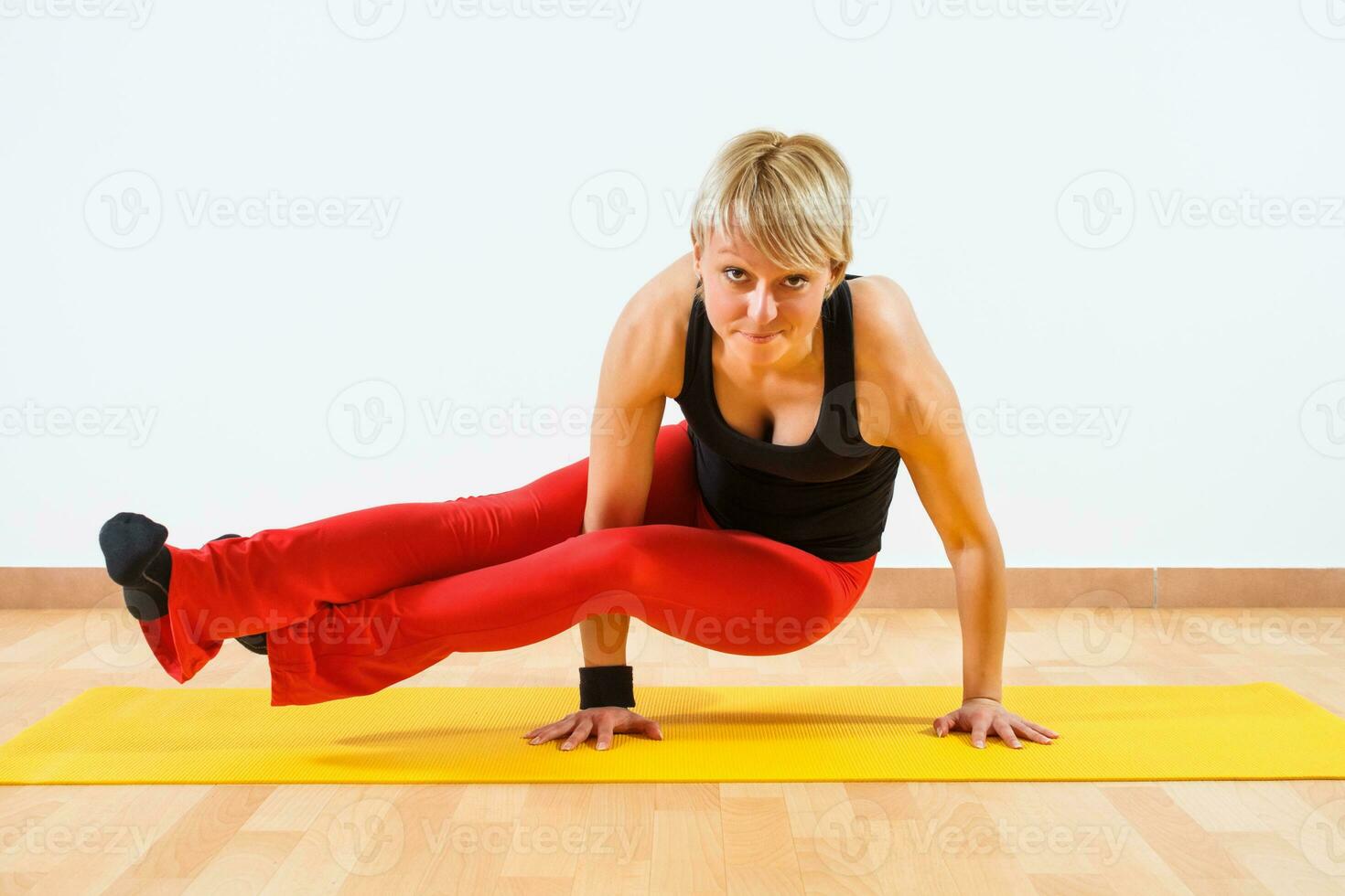 Woman exercising yoga photo