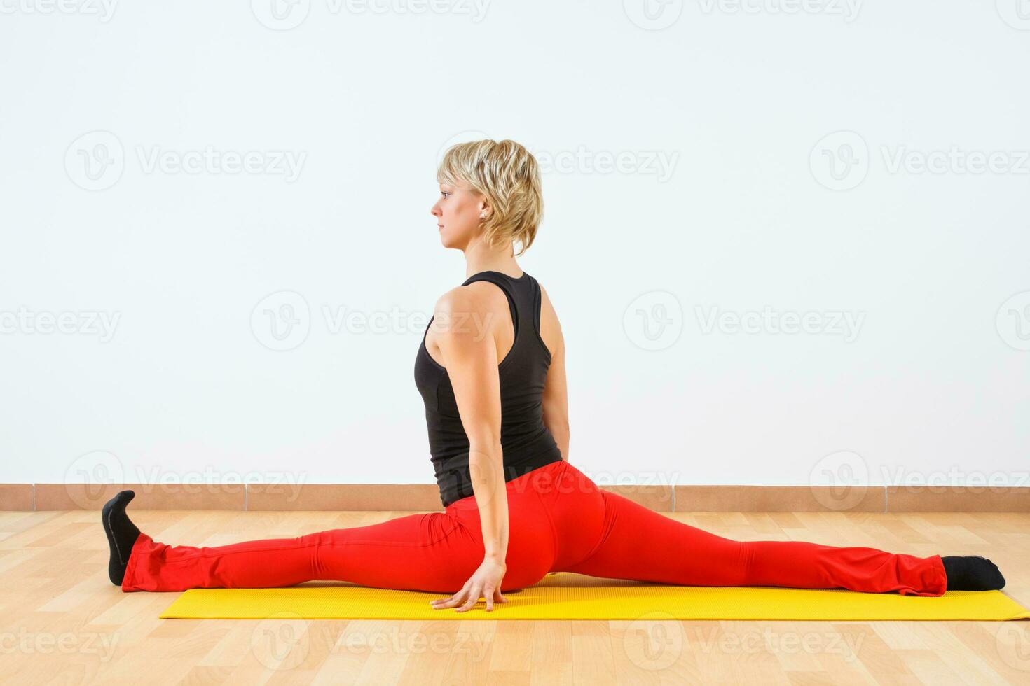 Woman exercising yoga photo
