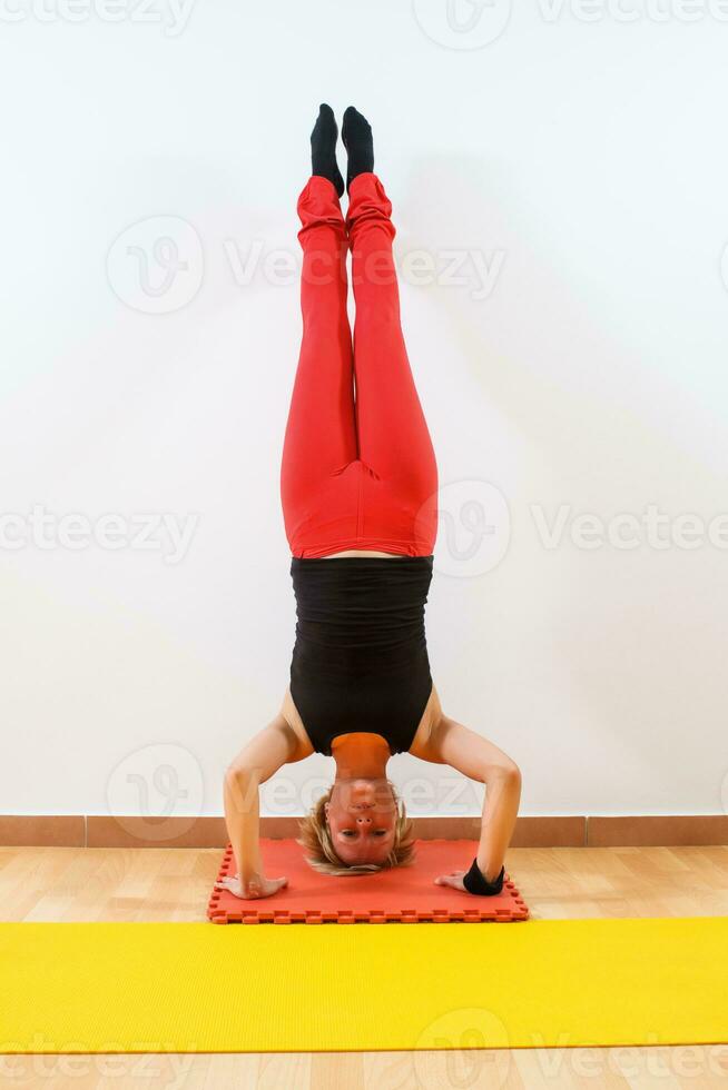 Woman exercising yoga photo