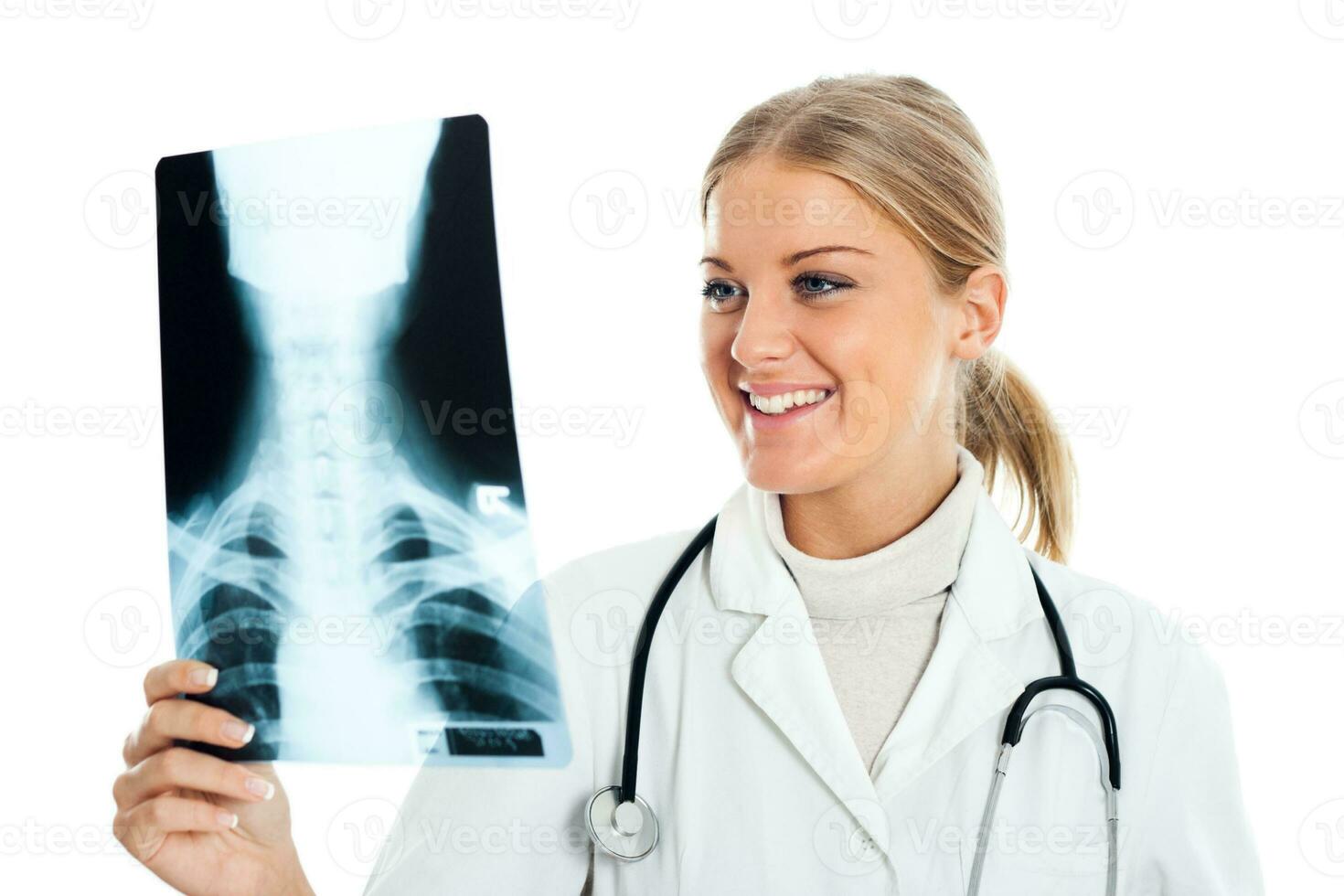 Doctor looking at x ray image photo