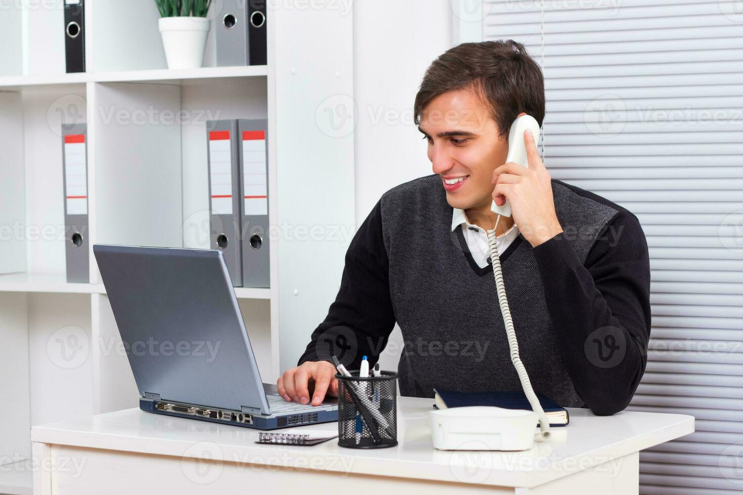 Businessman on the phone photo