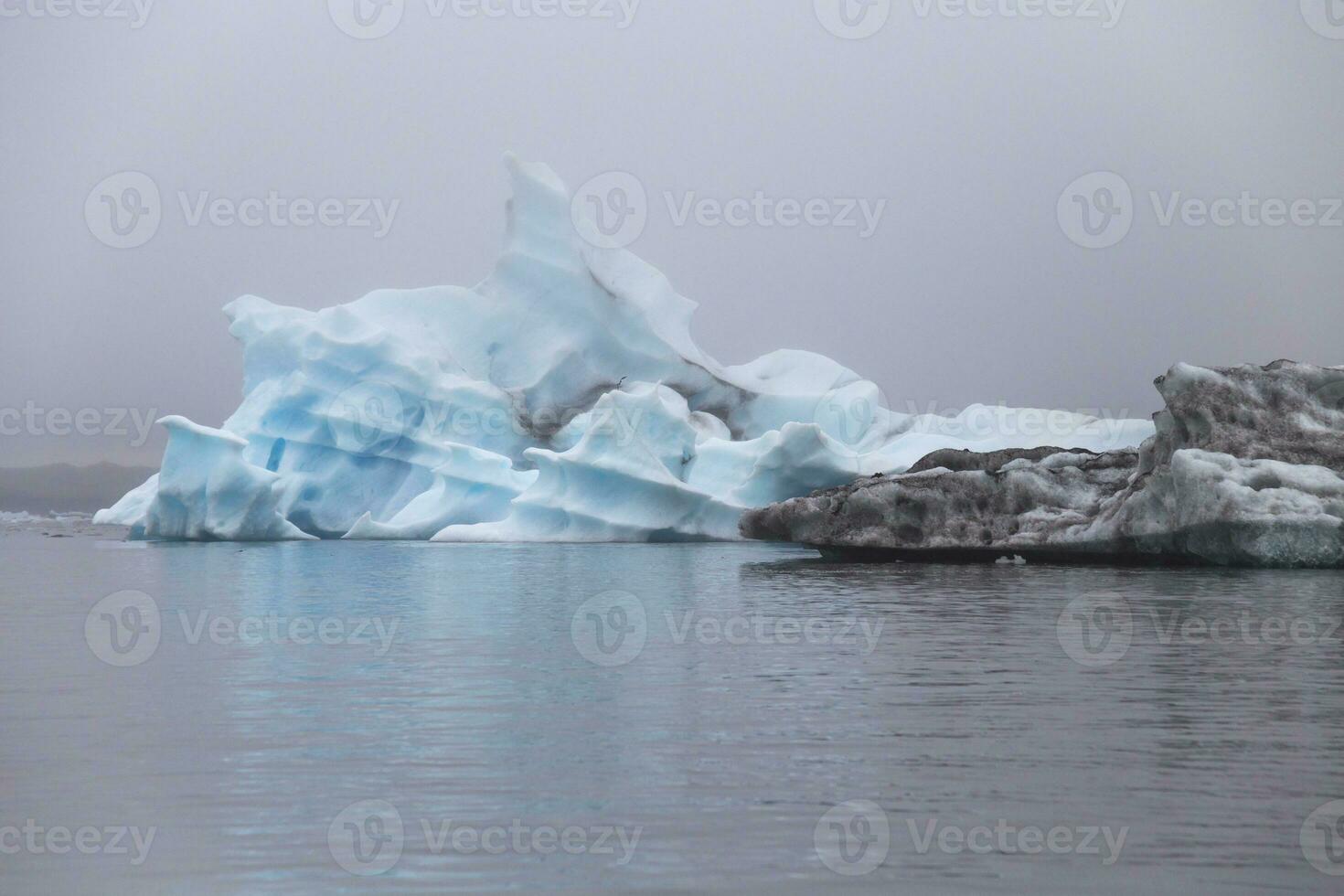 The Diamond Beach in Iceland.Image contains little noise because of high ISO set on camera. photo