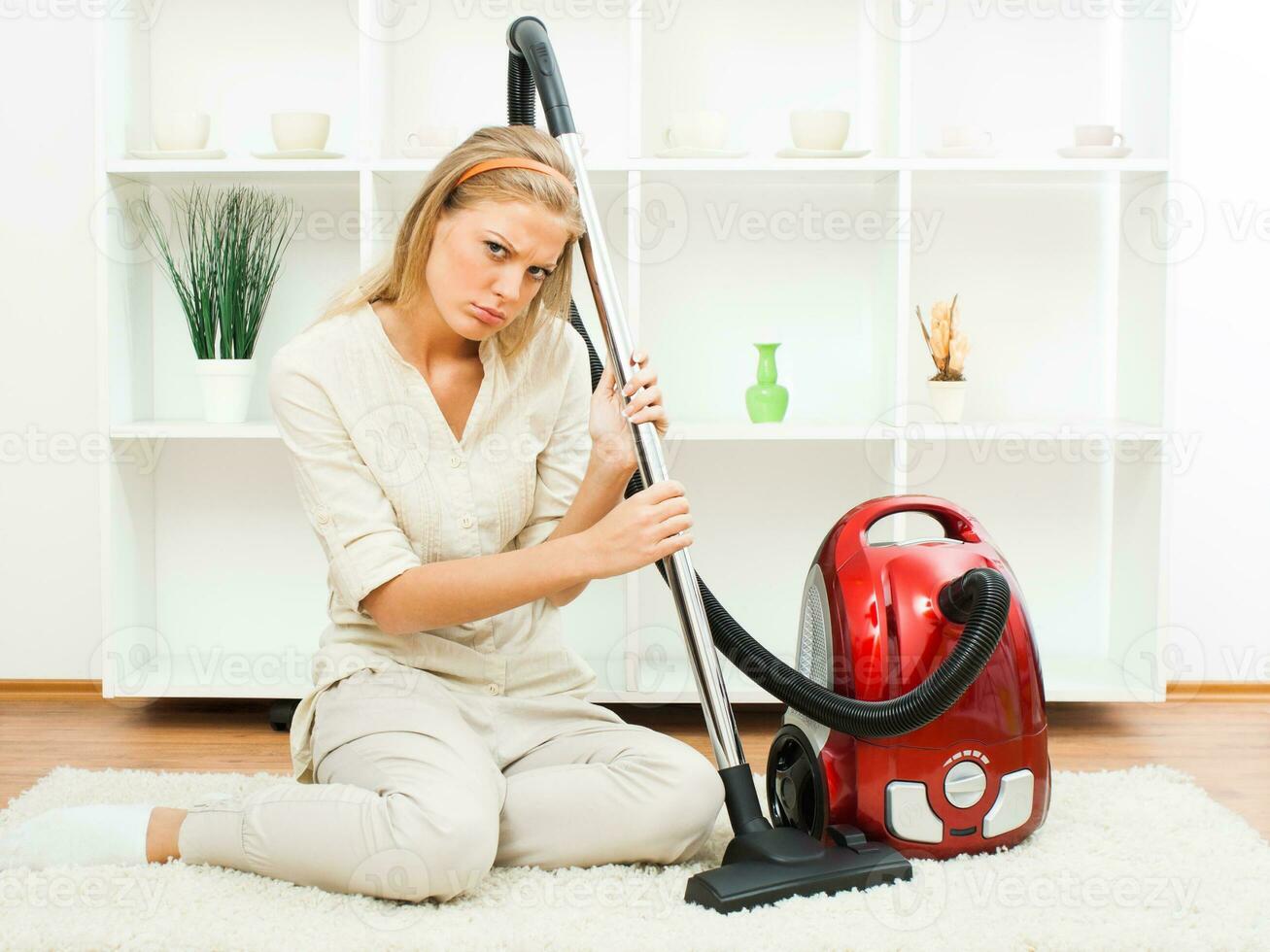 Tired housewife cleaning photo