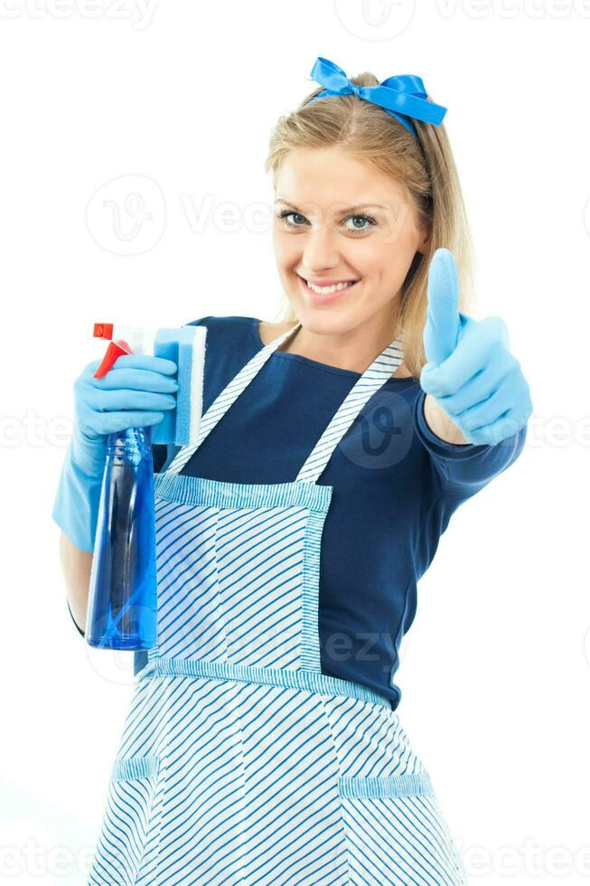 Cute housewife cleaning and showing thumb up photo