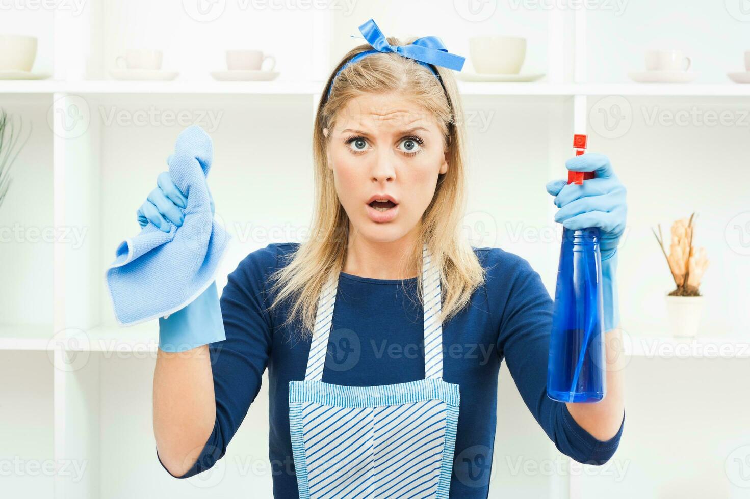 Exhausted housewife in panic photo