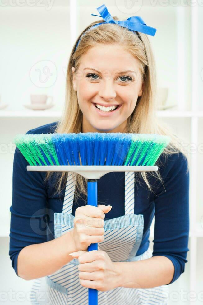 Cute housewife cleaning photo