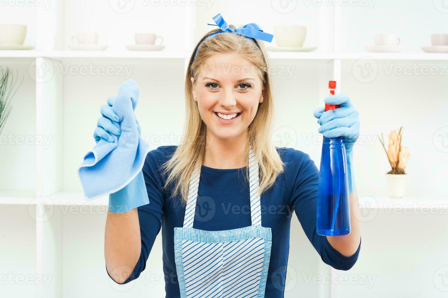 Cute housewife cleaning photo