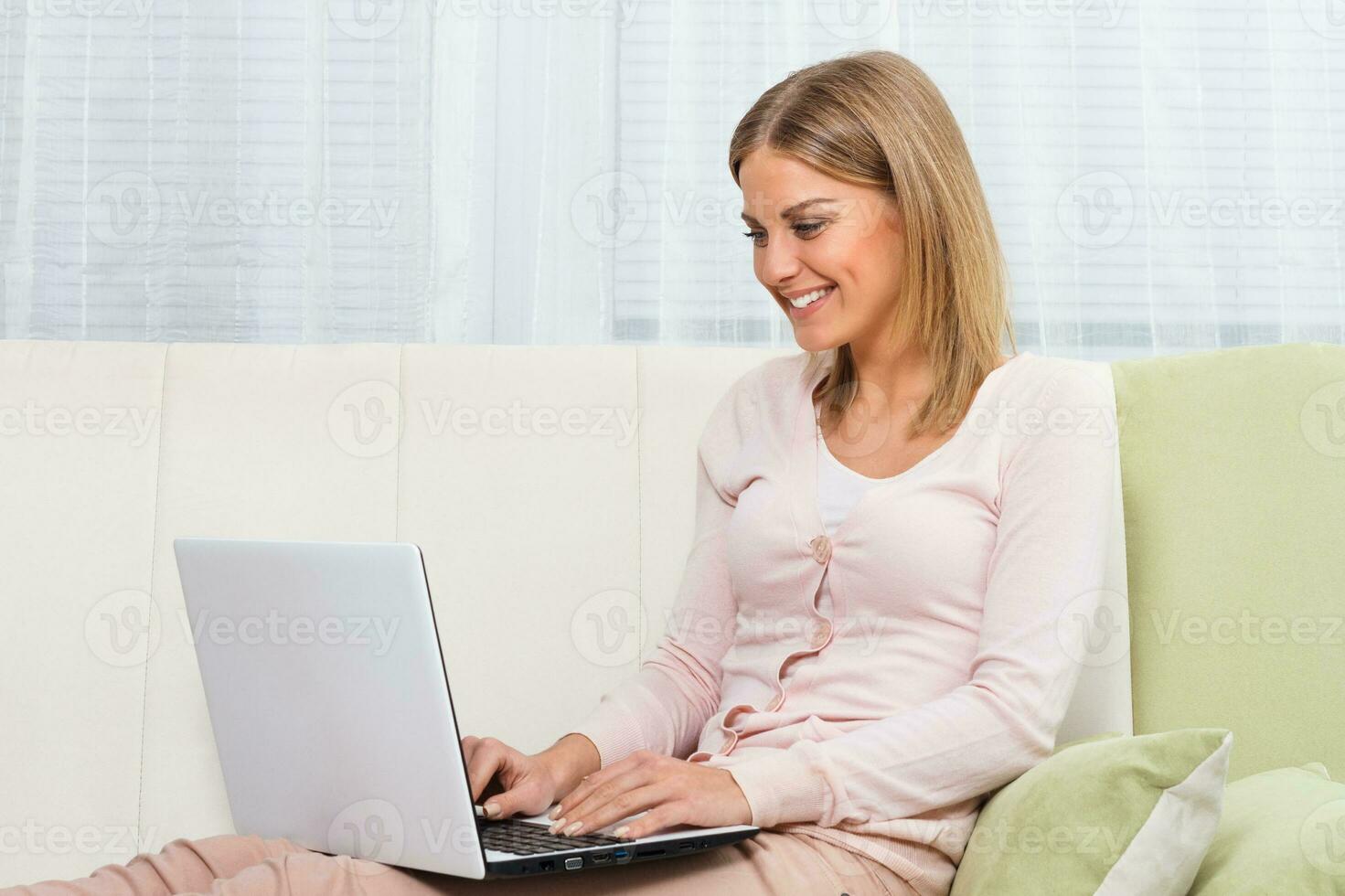 Woman using laptop photo