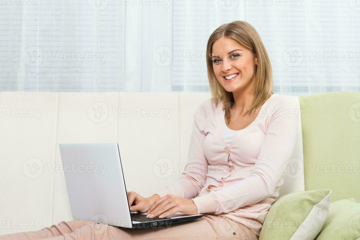 Woman using laptop photo