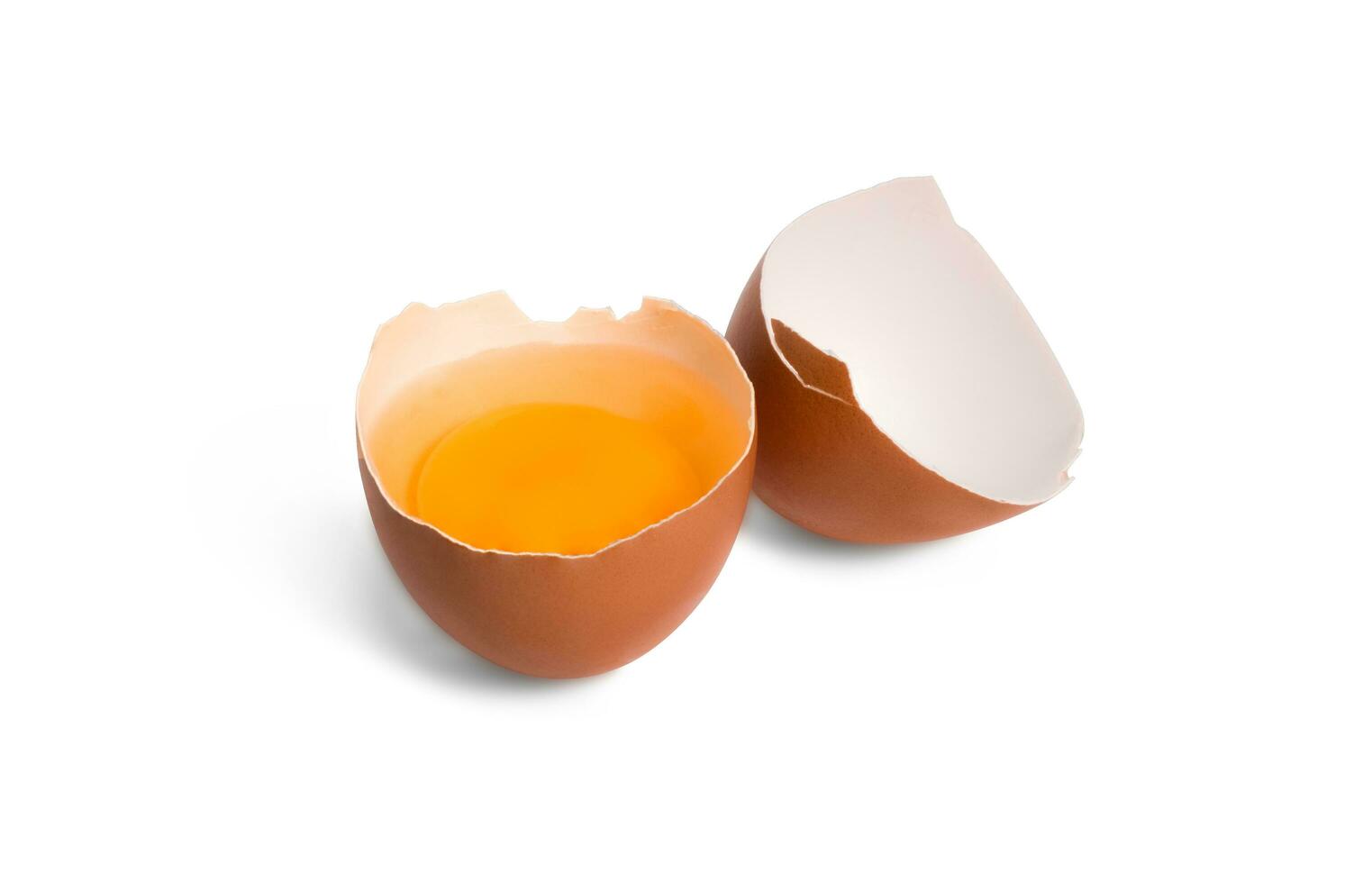 fresh organic chicken eggs and half-broken egg with yolk isolated on white background photo