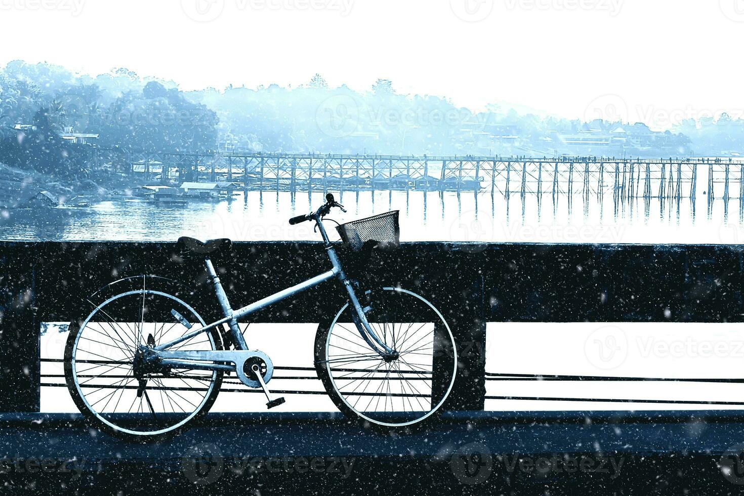 Vintage bikes on the bridge in the winter. photo