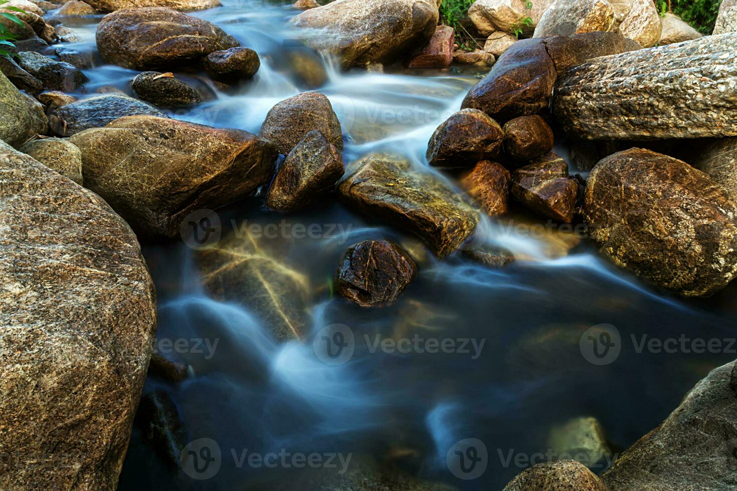 Small waterfall with water motion. photo