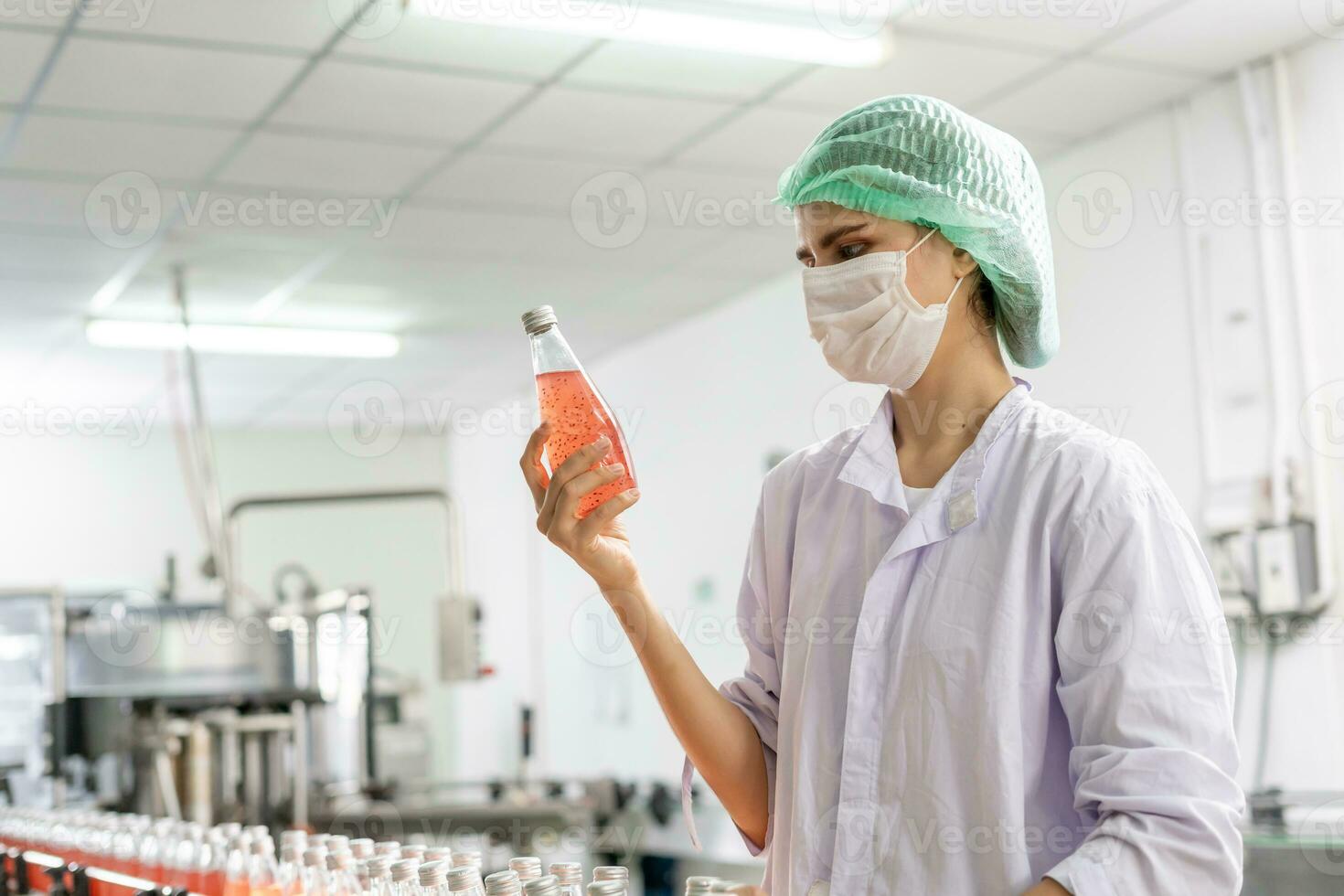 quality inspector food or beverages technician inspection about quality control food or beverages before send product to the customer. Production leader recheck ingredient and productivity. photo