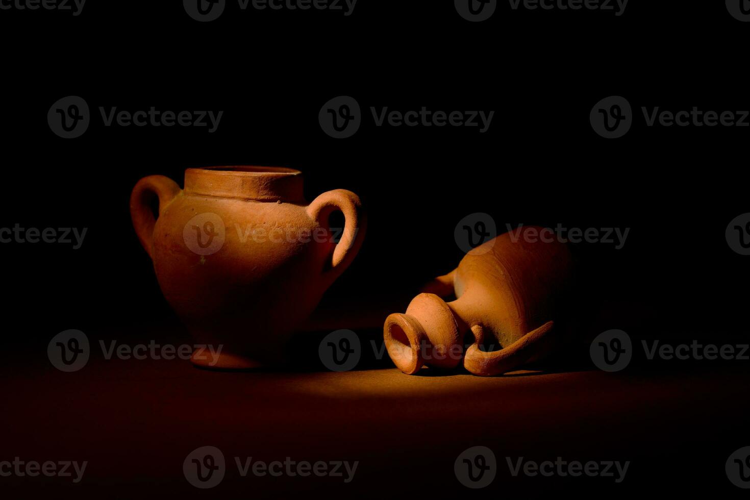 A pair of terracotta amphorae photo
