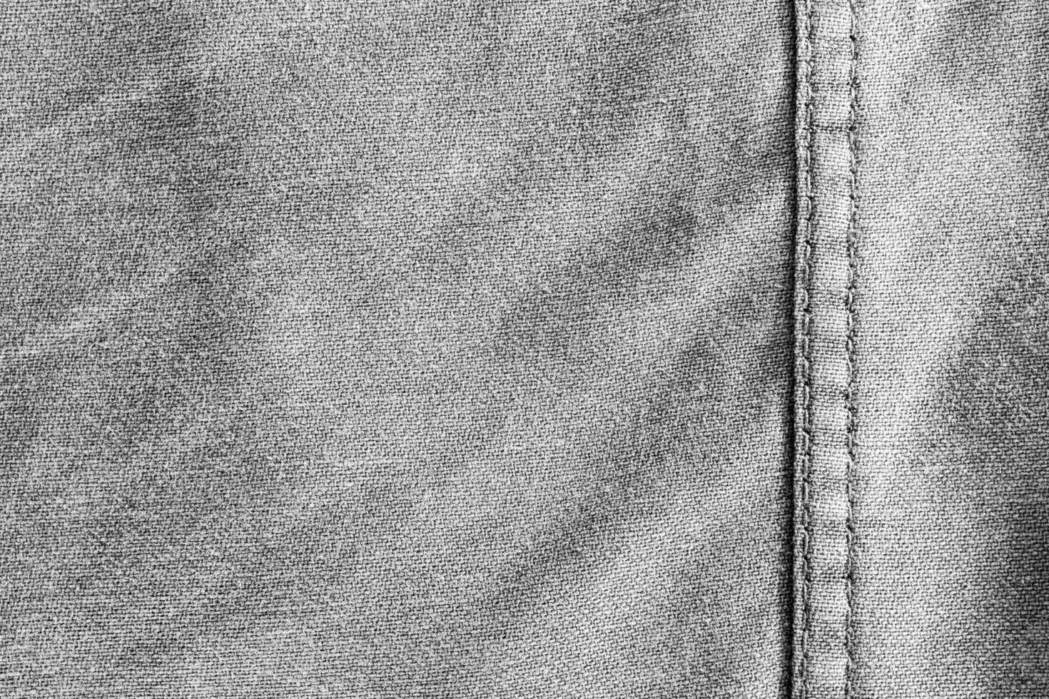 Texture and seam of denim fabric photo