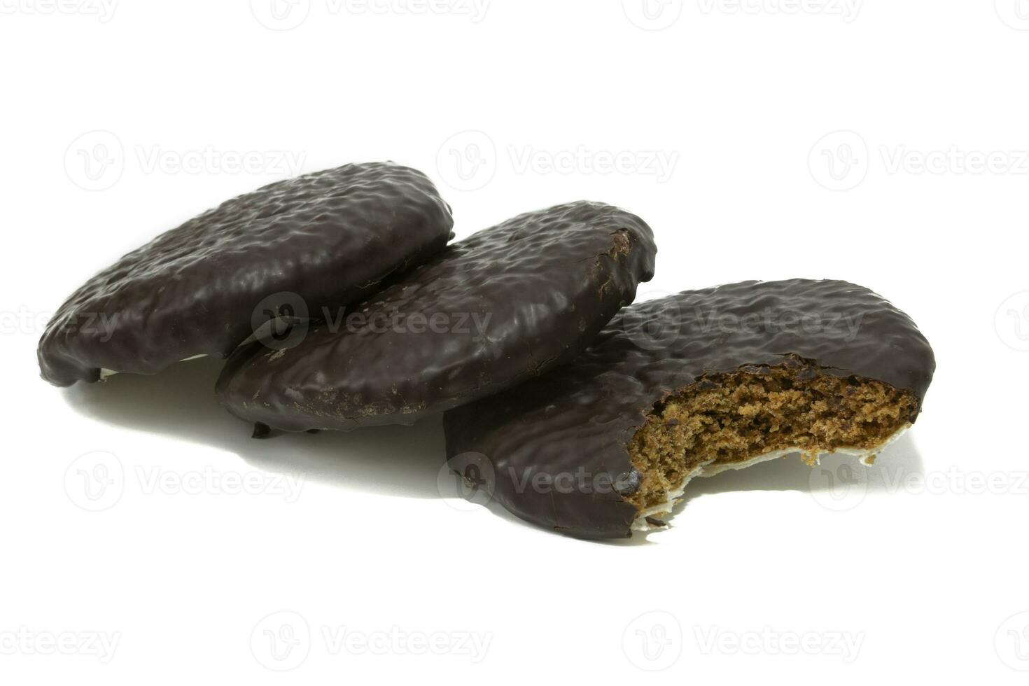 Three lebkuchen cakes, isolated on a white background. German food concept. photo