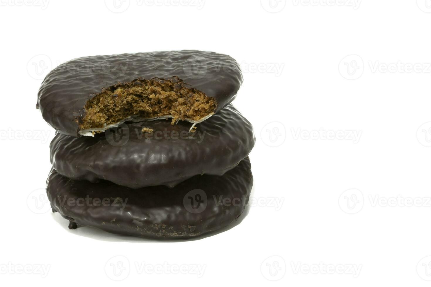 Three lebkuchen cakes, isolated on a white background. German food concept. photo