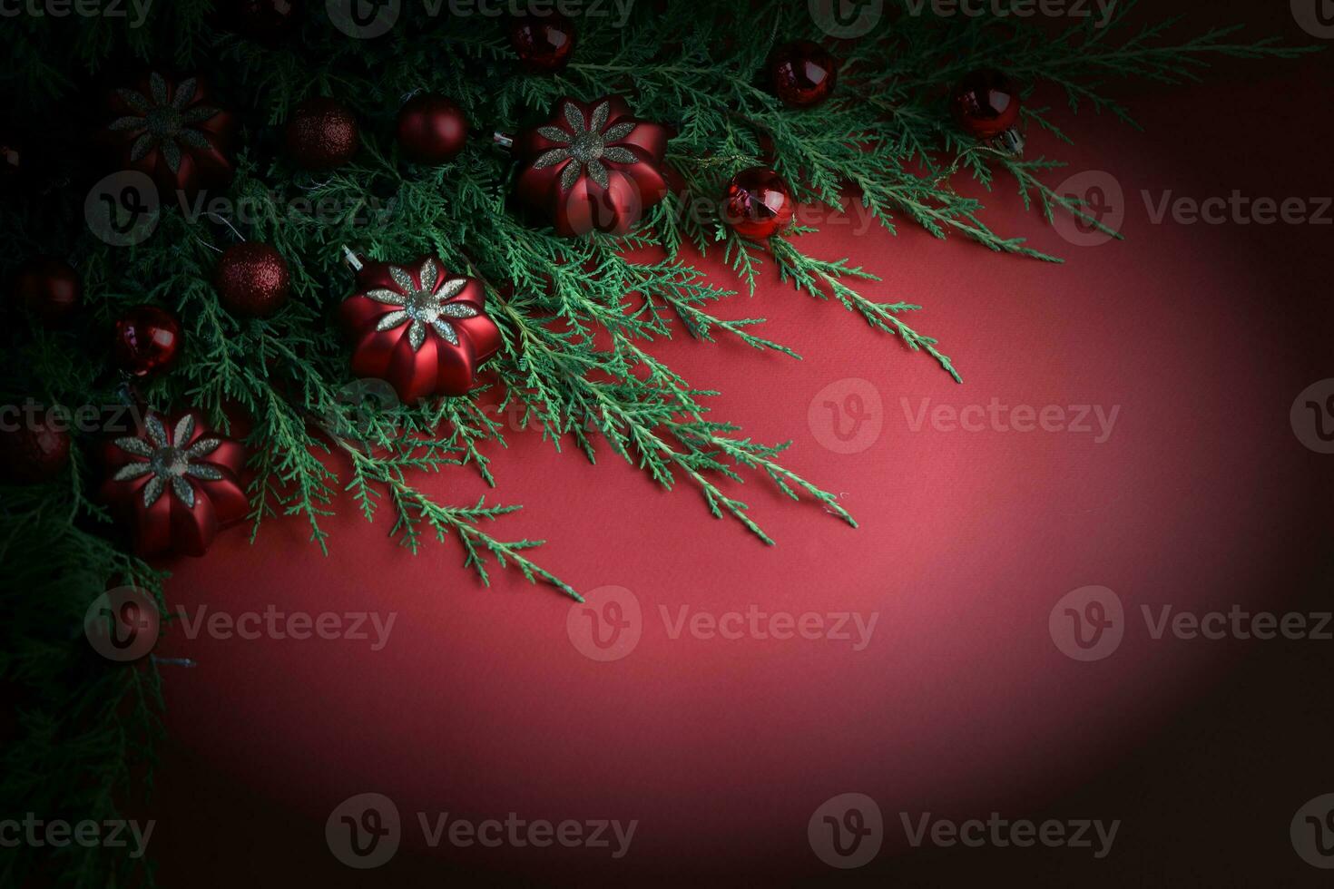 Red winter background with christmas decorations and copy space photo