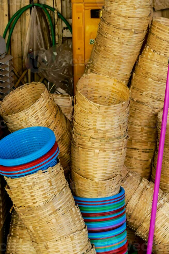 baskets are stacked together in a room photo