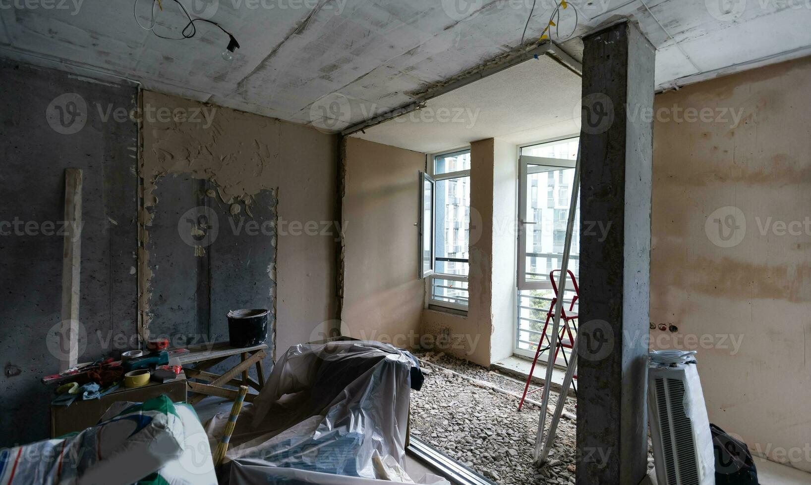 Home renovation in room full of painting tools photo