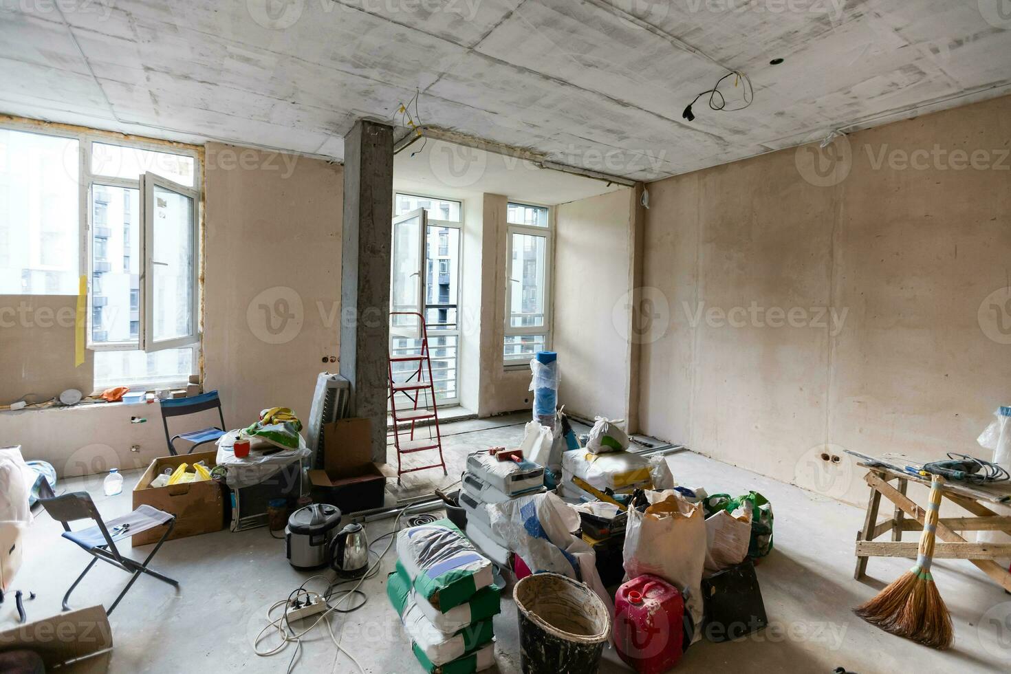 Home renovation in room full of painting tools photo
