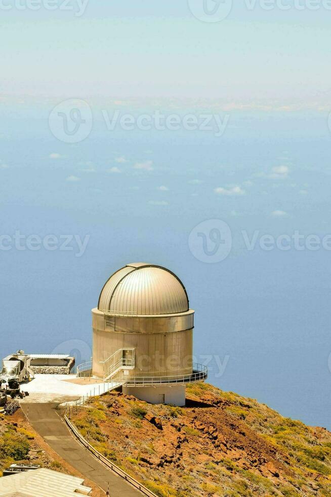 the observatory is located on the top of a mountain photo