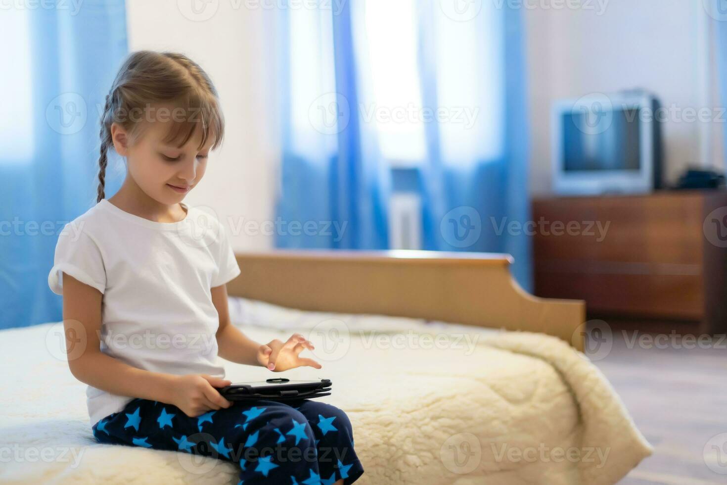 Remote lessons. The child smiles happily and gets knowledge remotely. Little girl study online learning from home with laptop. Online school. photo