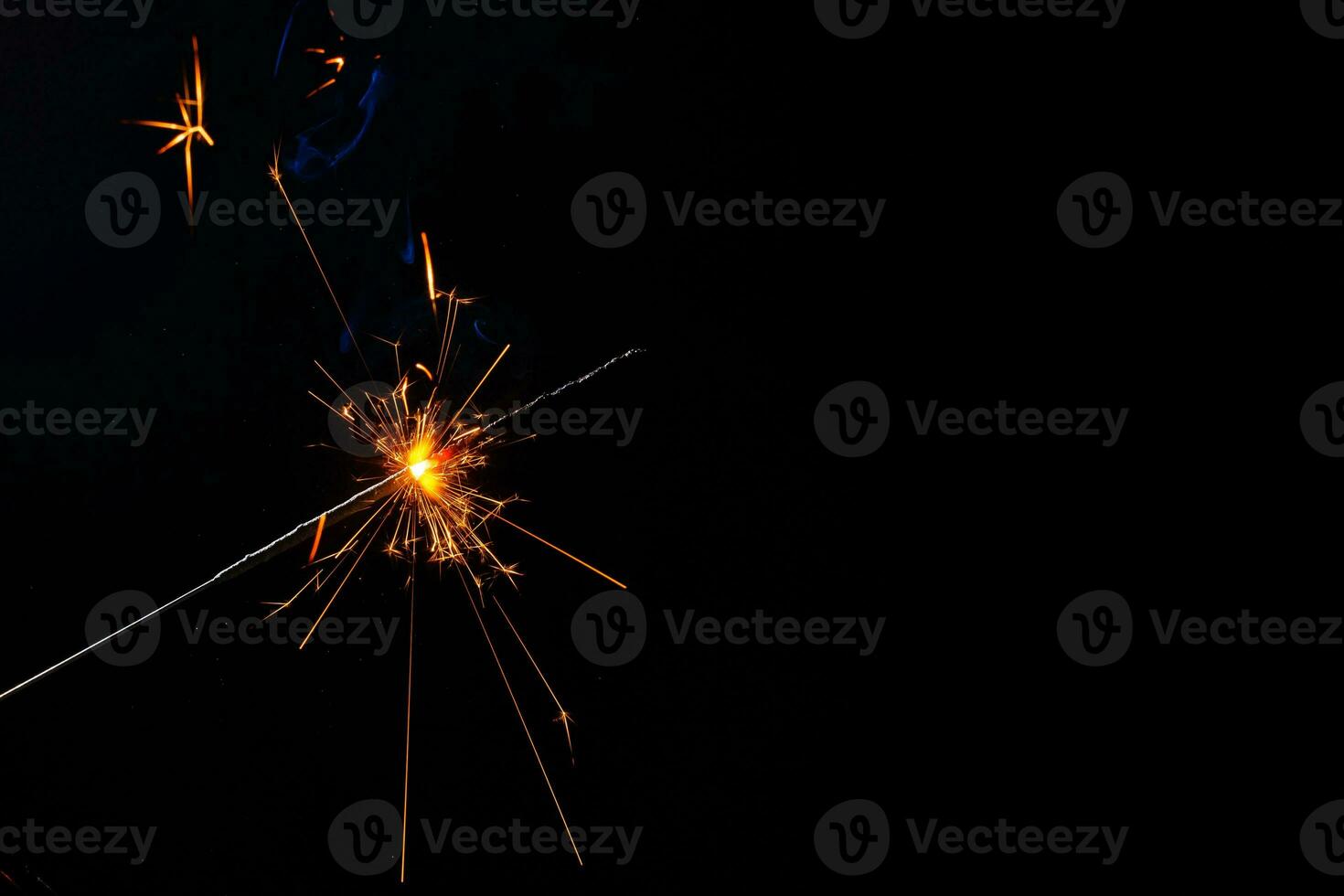 closeup view of burning sparkler photo