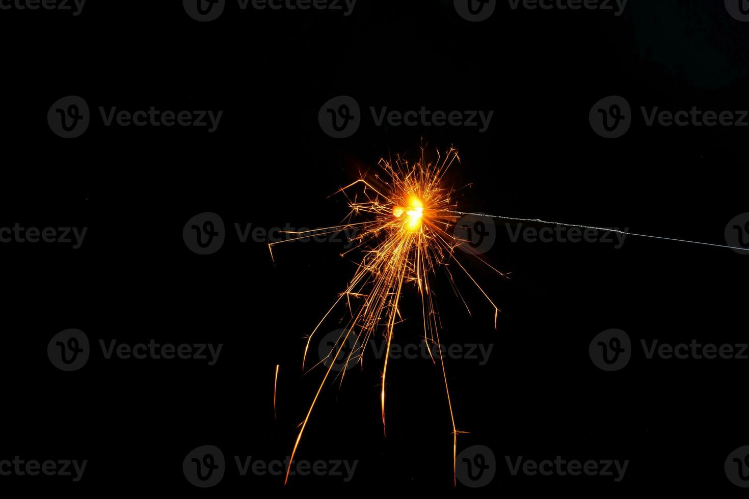 closeup view of burning sparkler photo