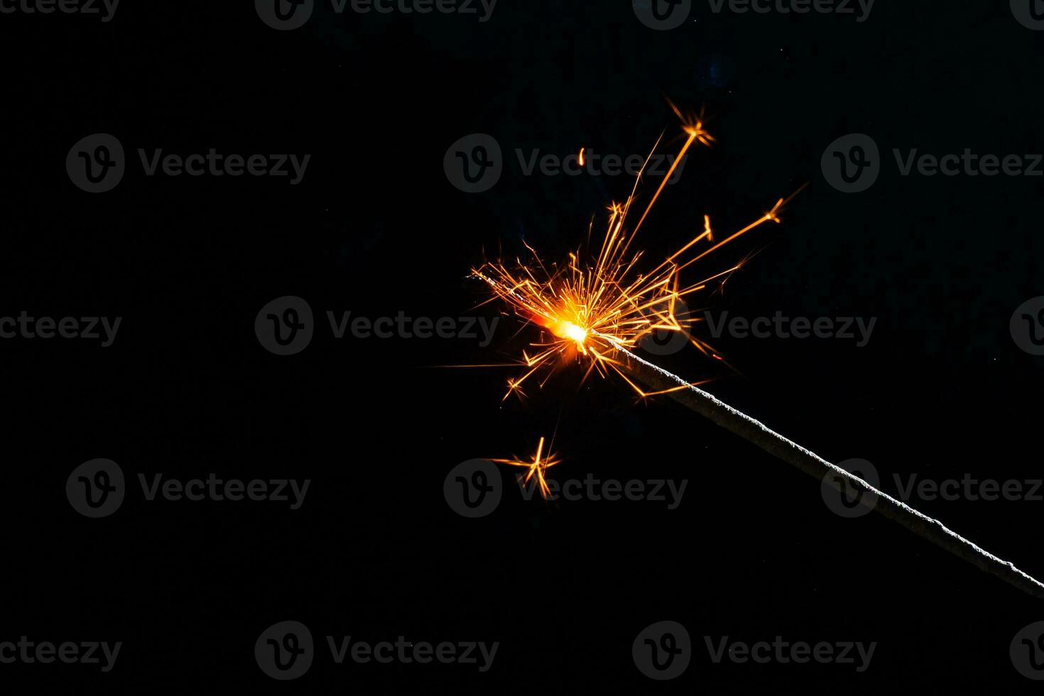closeup view of burning sparkler photo