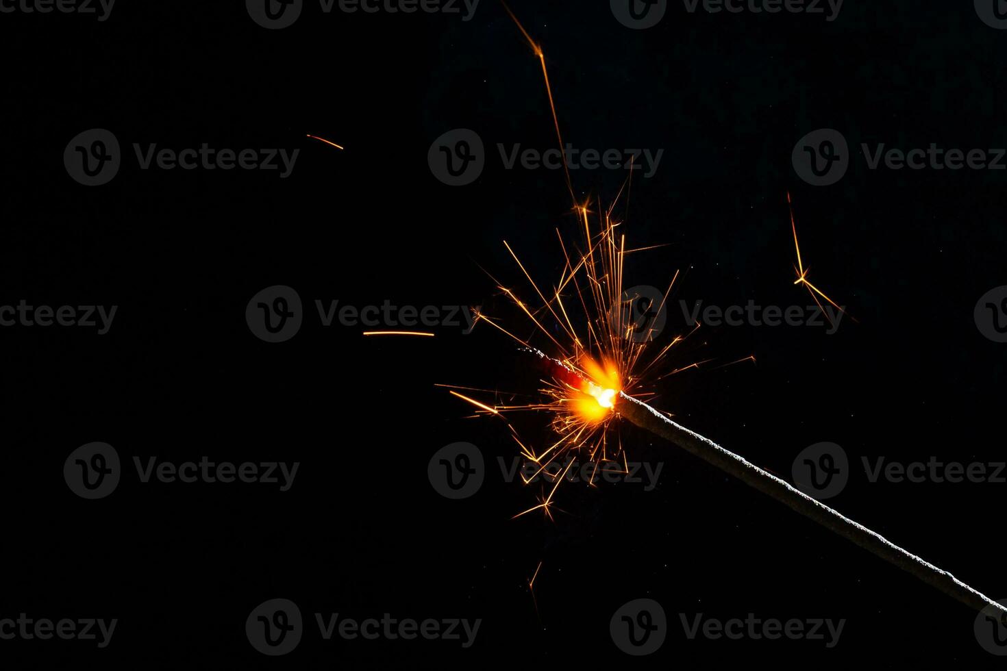 closeup view of burning sparkler photo