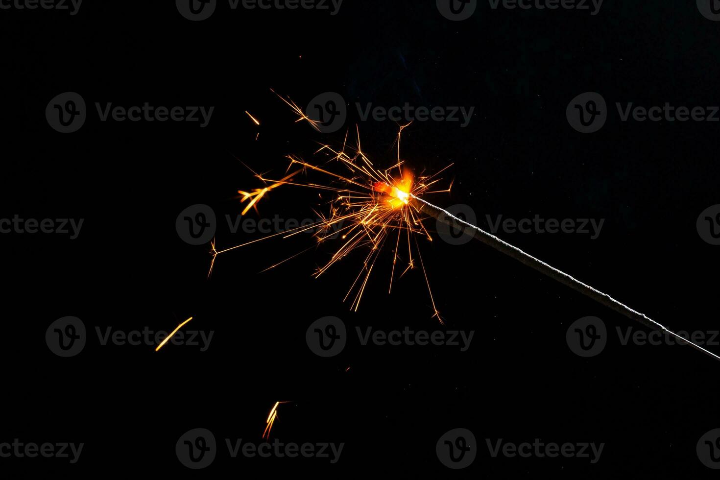 closeup view of burning sparkler photo