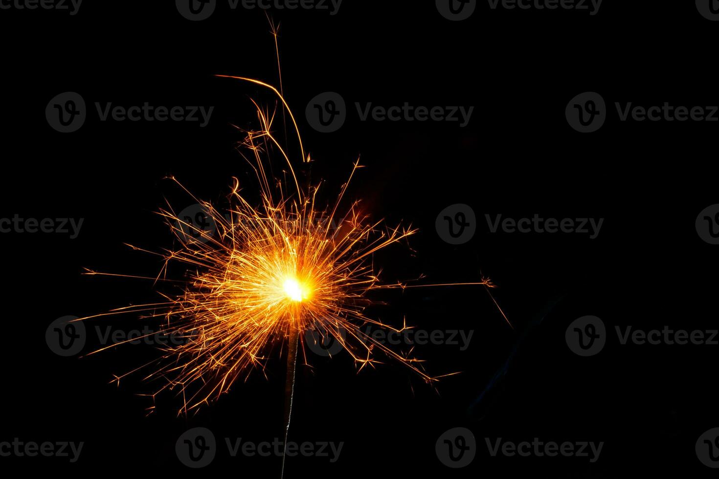 closeup view of burning sparkler photo