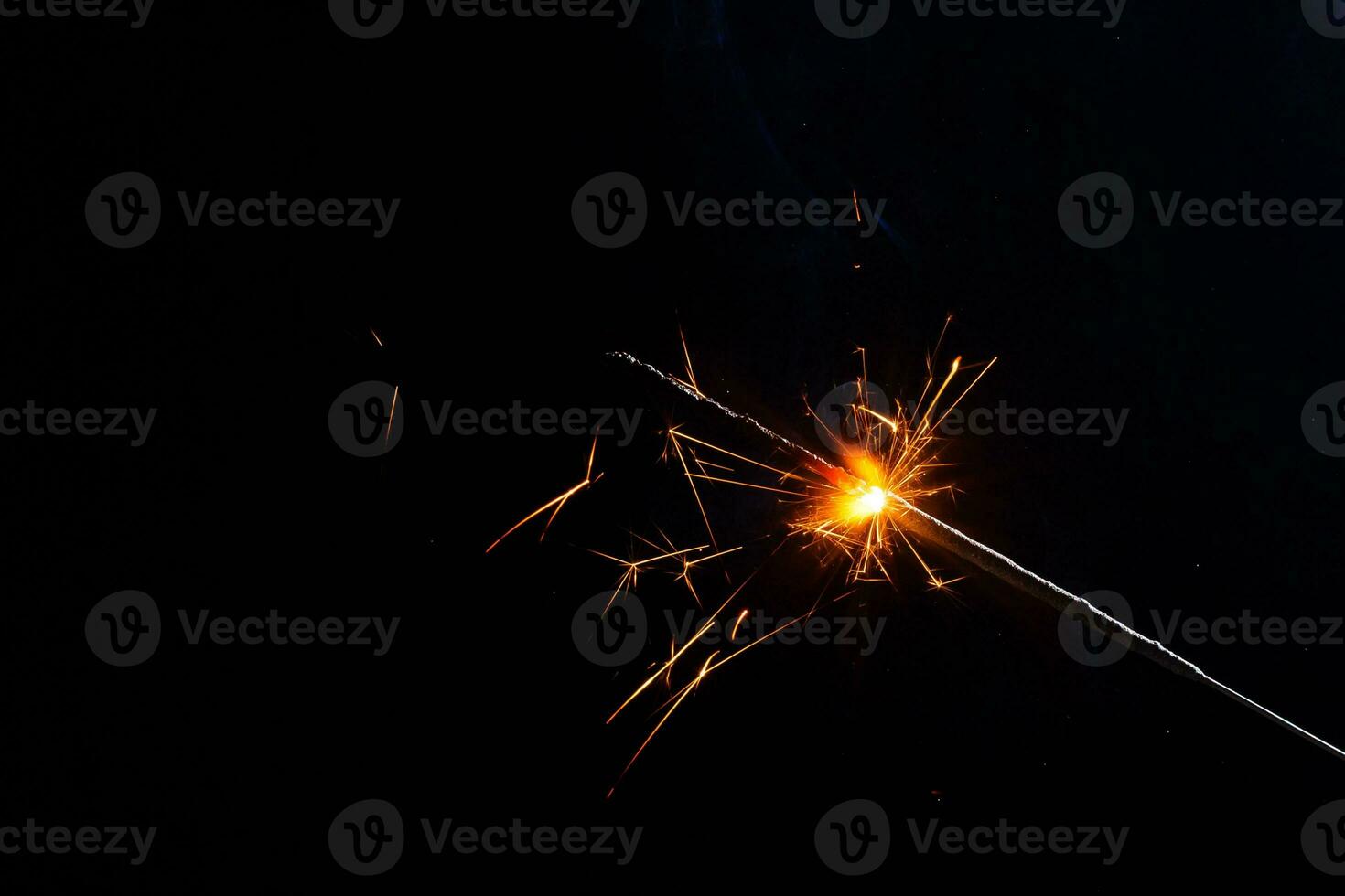 closeup view of burning sparkler photo