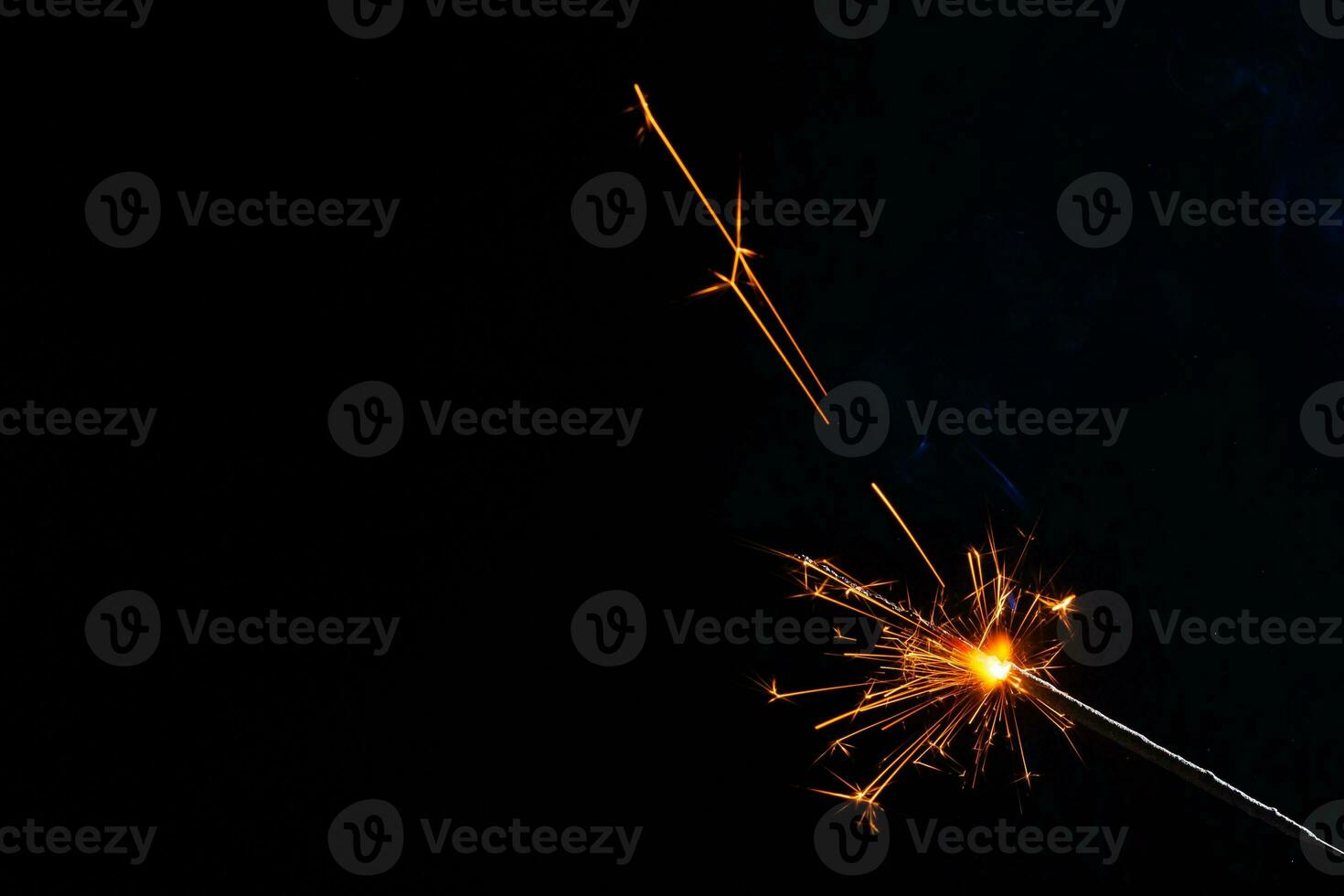 closeup view of burning sparkler photo