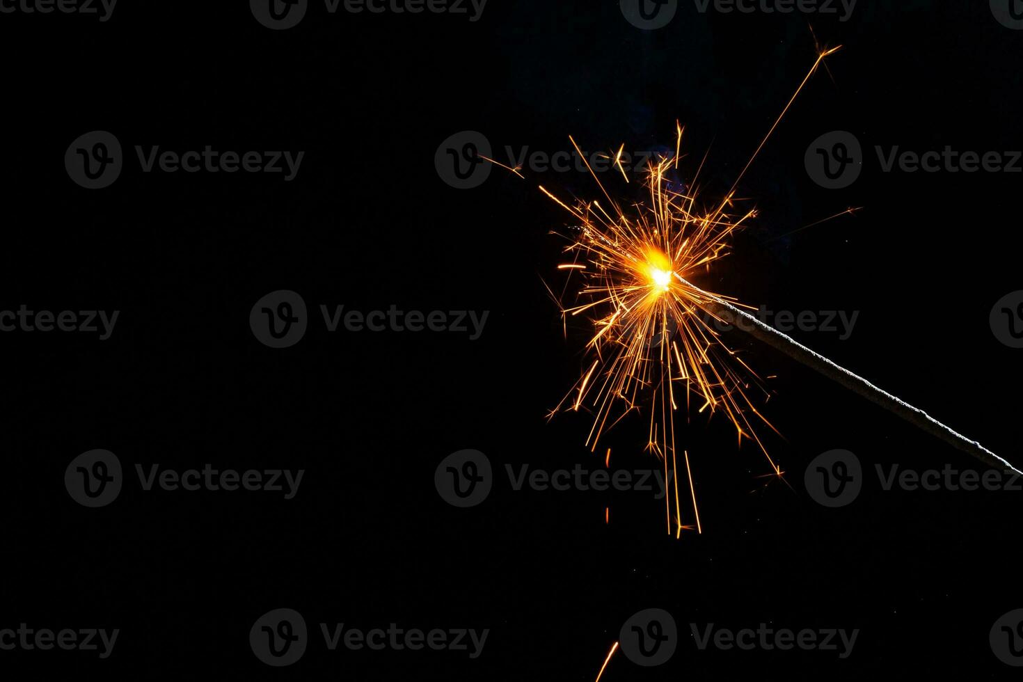 closeup view of burning sparkler photo